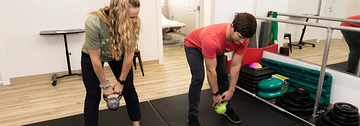 Chiropractic Reading PA Courtney Perry Doing Exercises With Patient