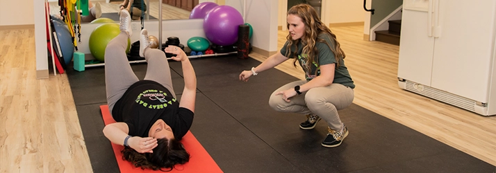 Chiropractor Reading PA Sarah Balthaser With Courtney Perry Doing Corrective Exercises