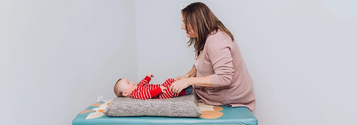 Chiropractor Reading PA Sarah Balthaser With Pediatric Patient